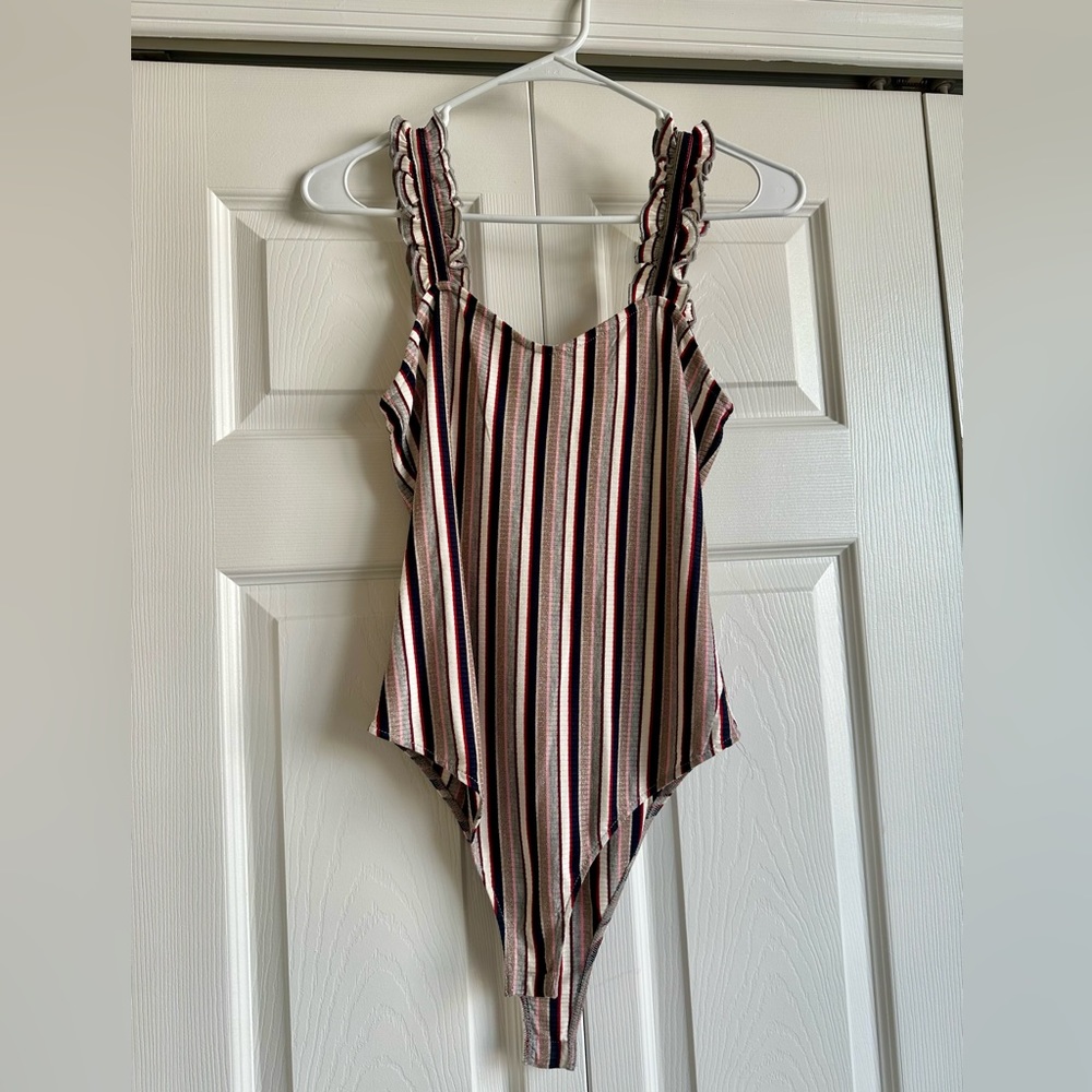 UNWORN WITH TAGS! — Wild Honey — multi colored body suit — Size M